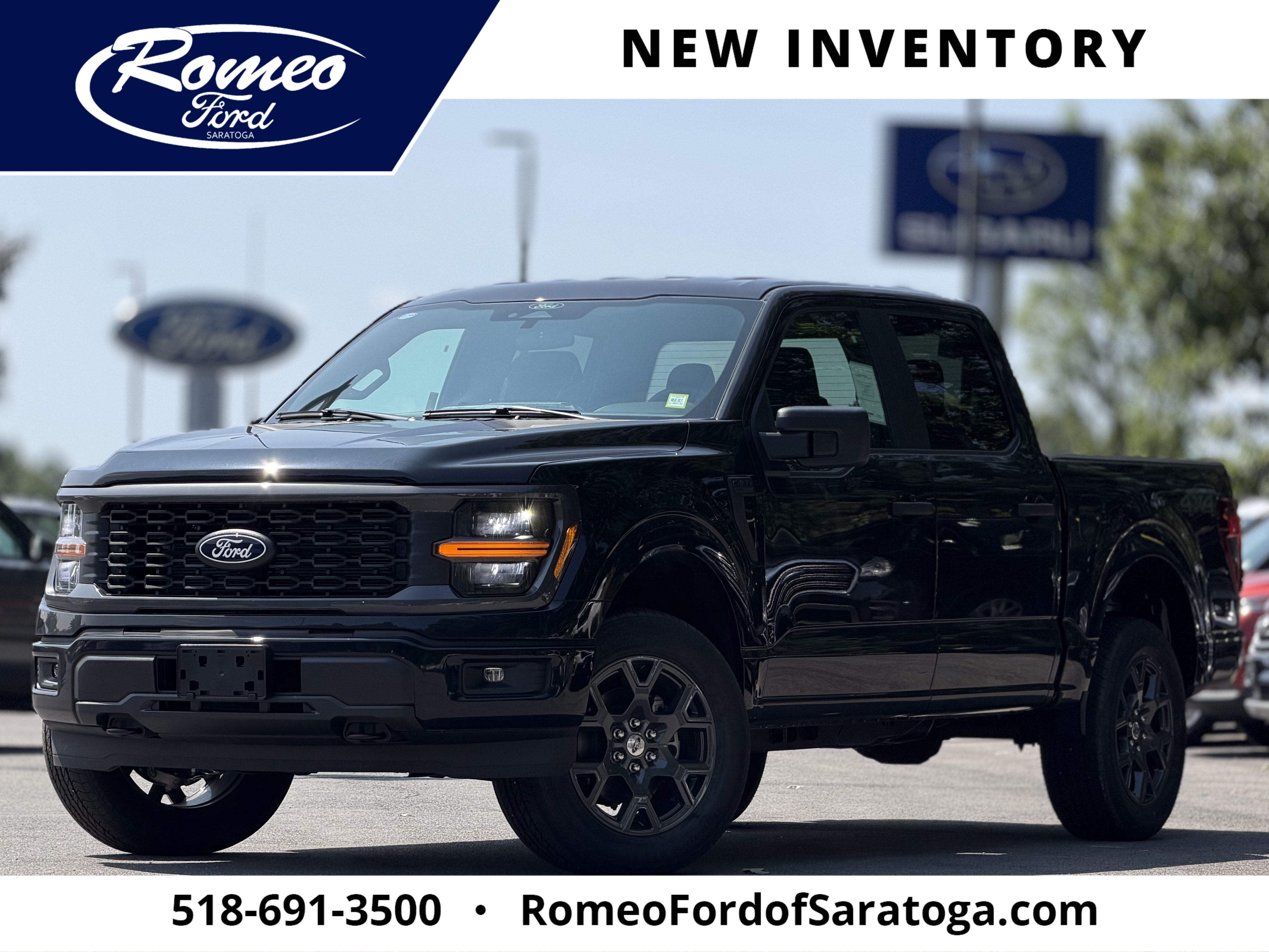 2026 Ford F-150 STX in Agate Black Metallic — front three-quarter view