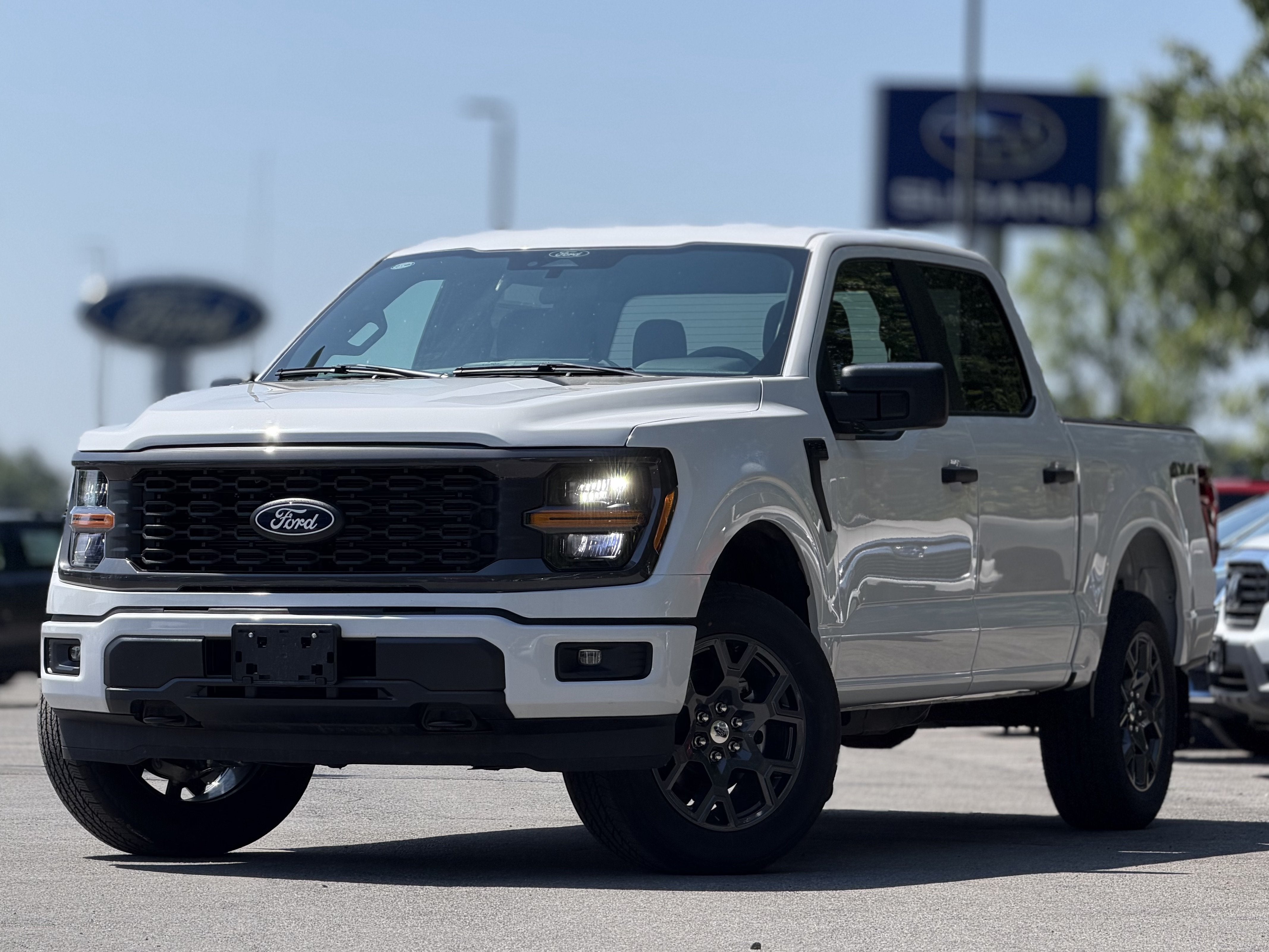 2026 Ford F-150 STX in White — front three-quarter view