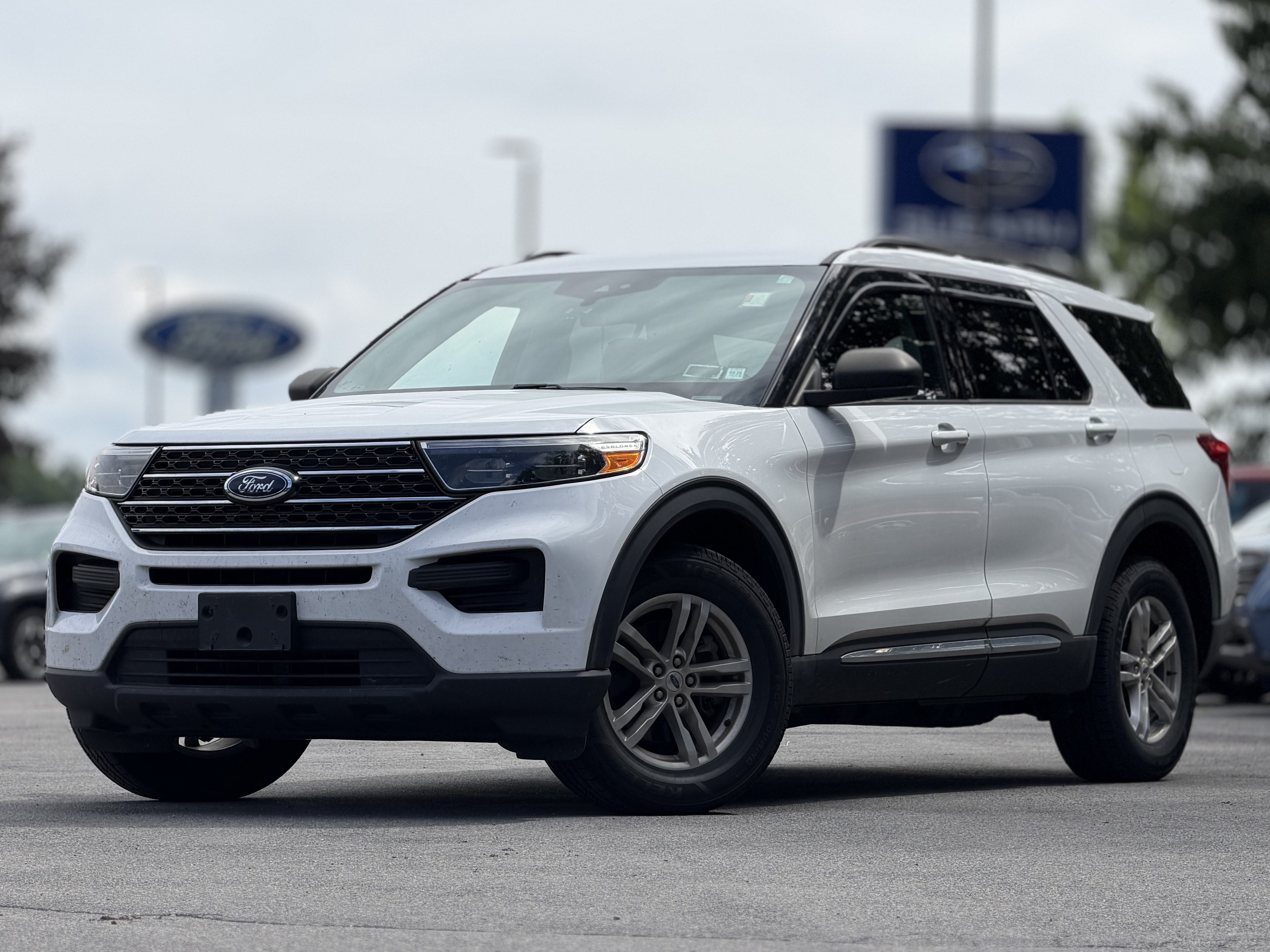 2020 Ford Explorer XLT in Oxford White — front three-quarter view