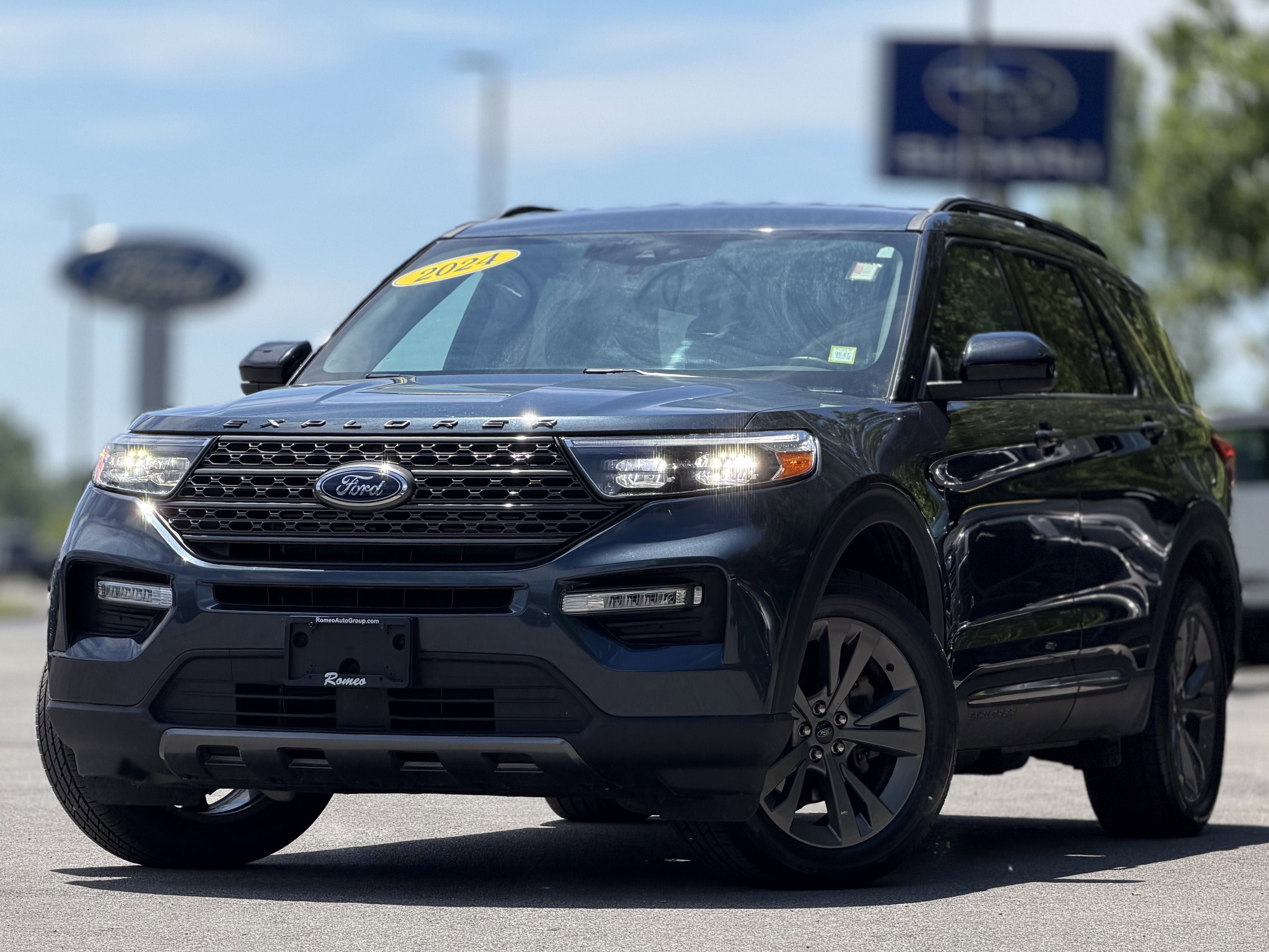 2024 Ford Explorer XLT in Blue Metallic — front three-quarter view