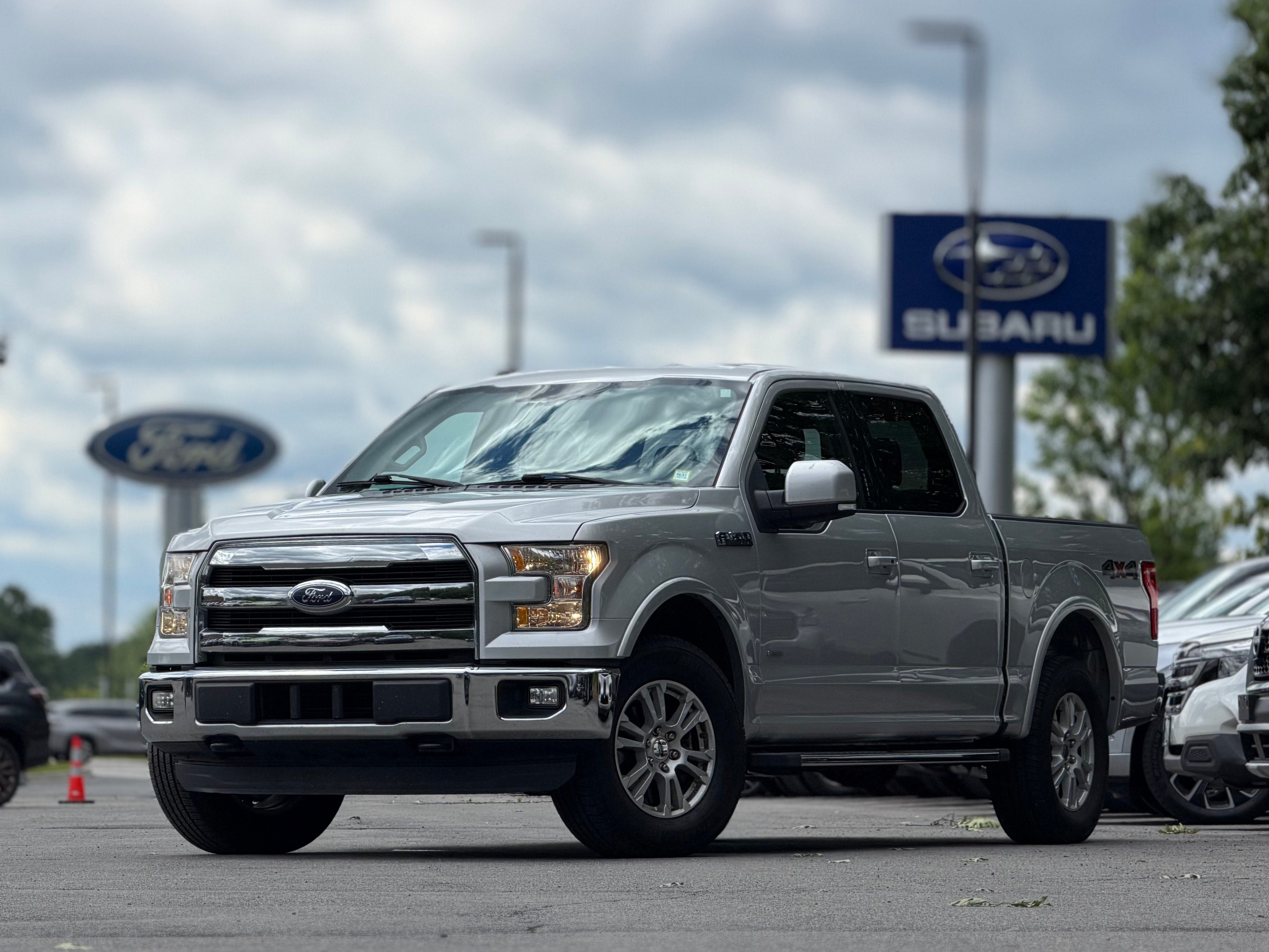 2016 Ford F-150 Lariat in Ingot Silver — front three-quarter view